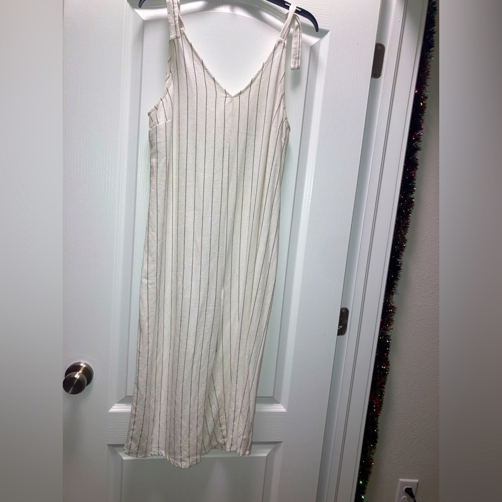 White and black pin striped jumper.